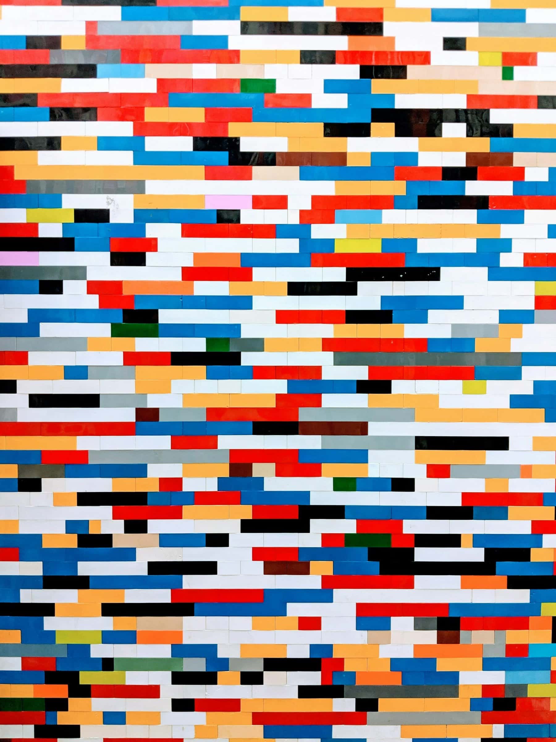 Legos of many colors fitted together in a large rectangle.