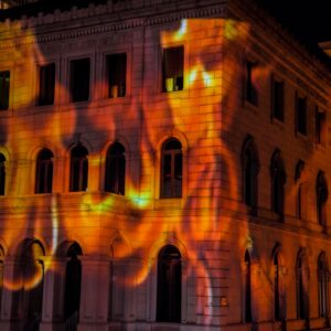 projections of fire on the buildings surrounding Capitol Square